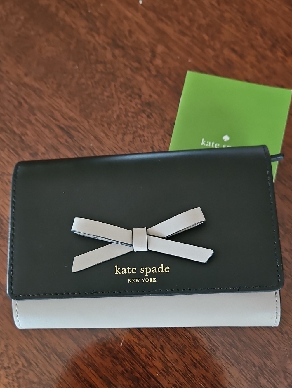 NWB Kate Spade Black and Beige Bow-Accent Wallet